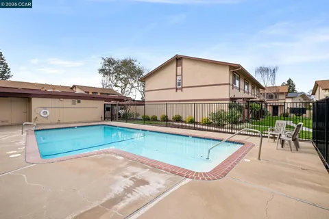 a view of a chairs and table on the terrace