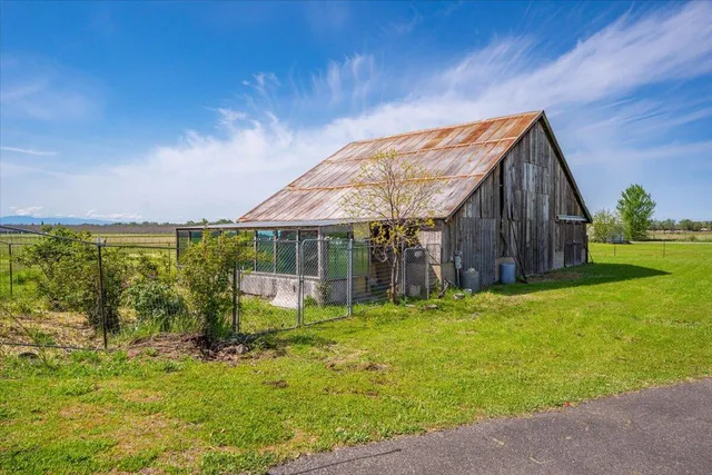 a view of a room with an outdoor space