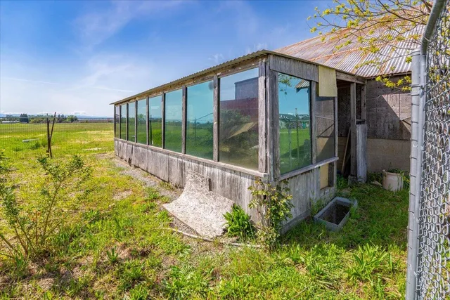 a view of a back yard of the house