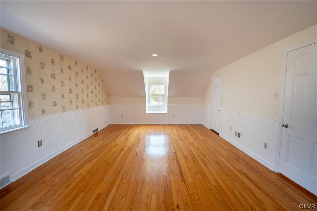 719 14th Avenue Bethlehem, PA 18018 - Photo 15 of 33 an empty room with wooden floor and windows