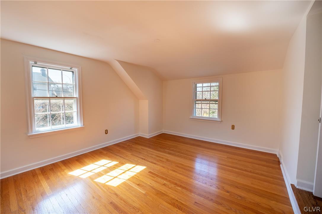 719 14th Avenue Bethlehem, PA 18018 - Photo 20 of 33 a view of an empty room with wooden floor and a window
