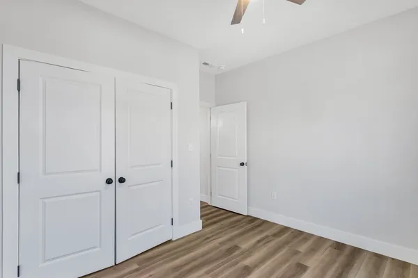 a view of room with hardwood floor
