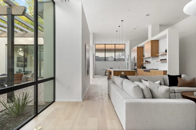 a view of an entryway with wooden floor