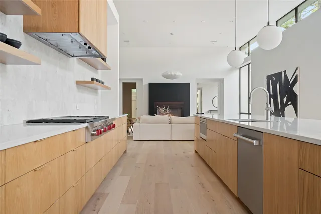a kitchen with a stove and a cabinets