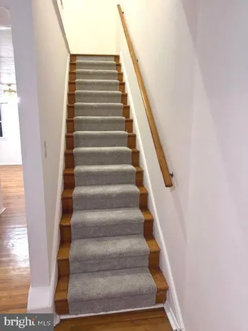 a bathroom with a toilet a sink and bathtub