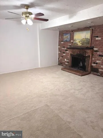 a utility room with cabinets washer and dryer