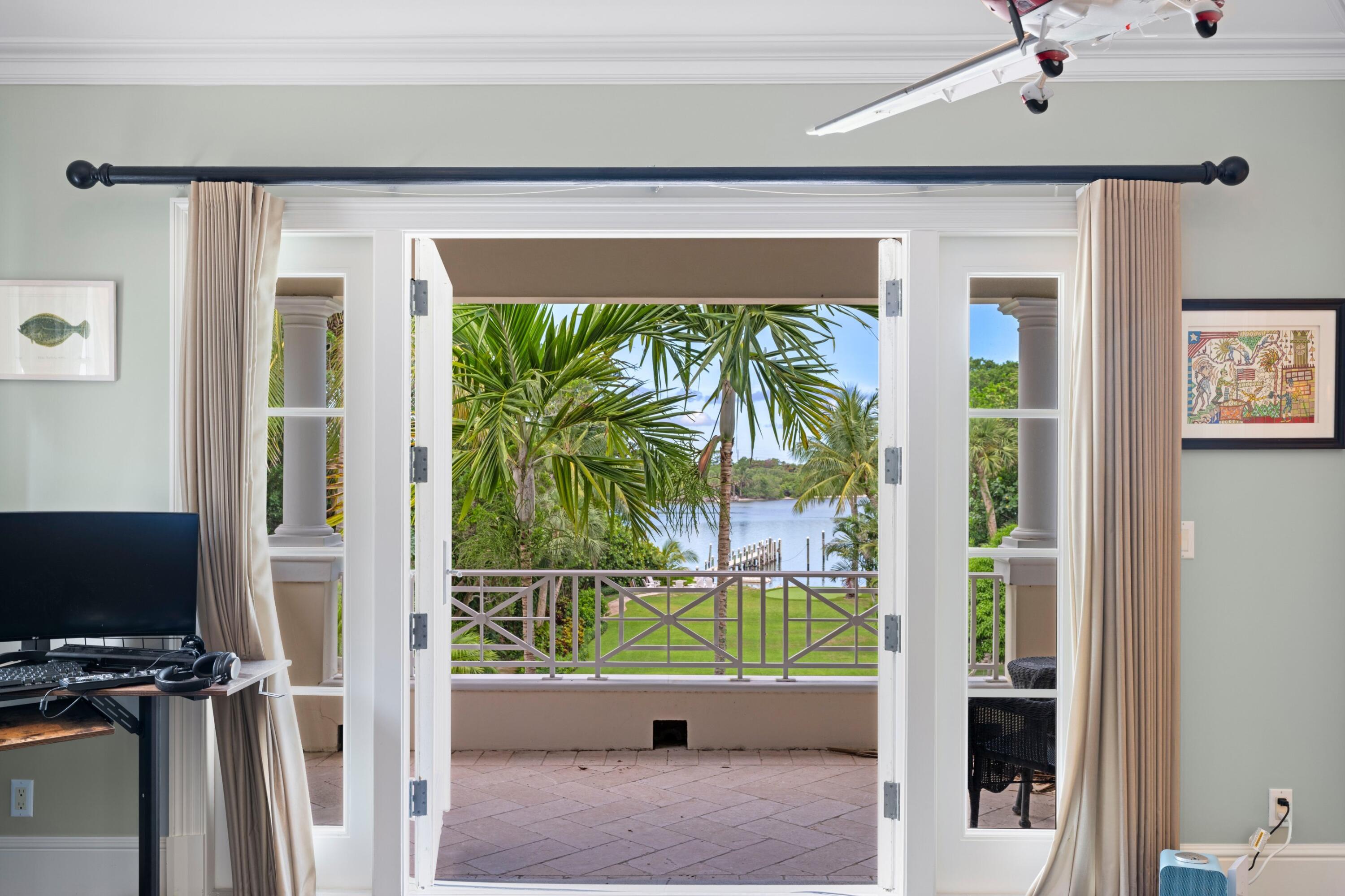 202 Gomez Road Hobe Sound, FL 33455 - Photo 20 of 33 a view of entryway door