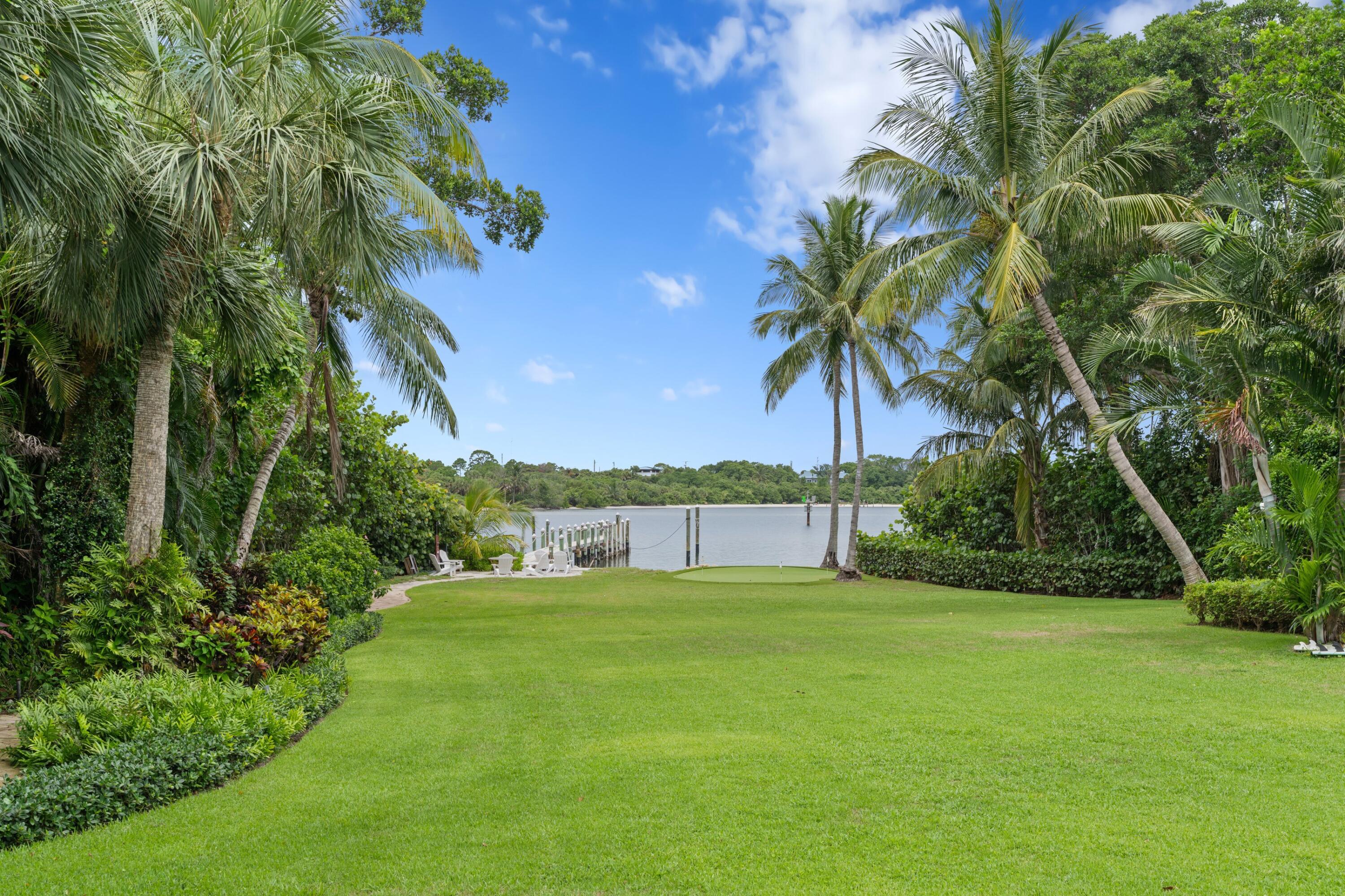 202 Gomez Road Hobe Sound, FL 33455 - Photo 27 of 33 a view of a backyard