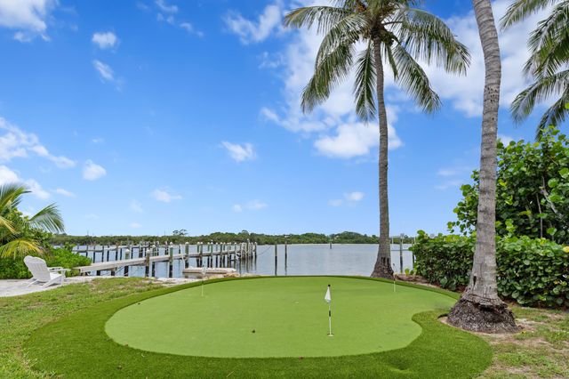a view of a balcony with lake view and mountain view