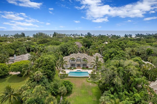 a view of a balcony with two chairs