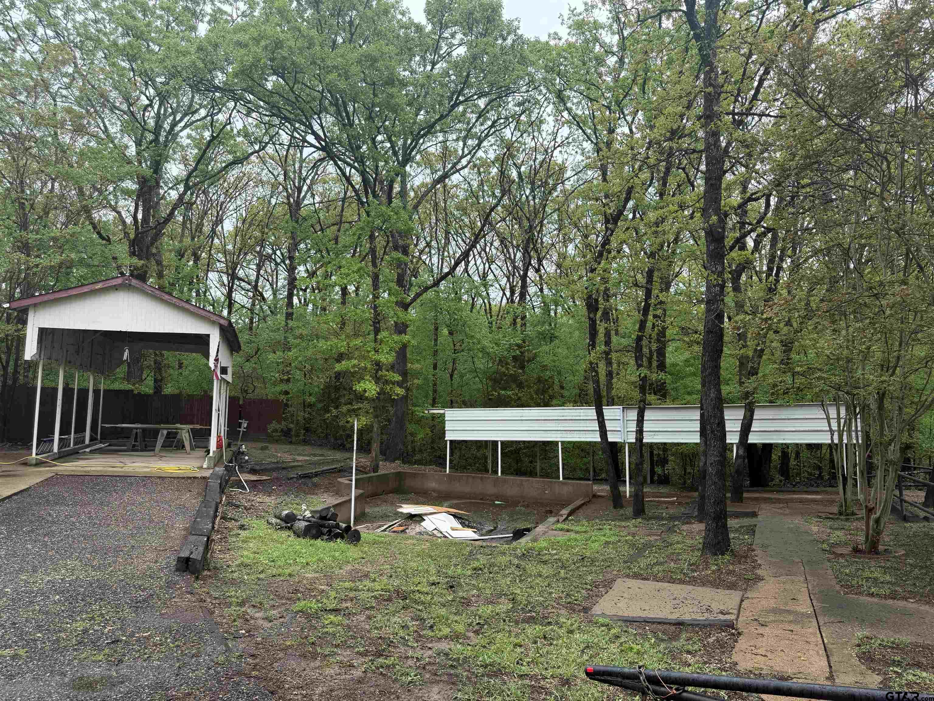 449 Rs Private Road Emory, TX 75440 - Photo 3 of 20 a backyard of a house with table and chairs