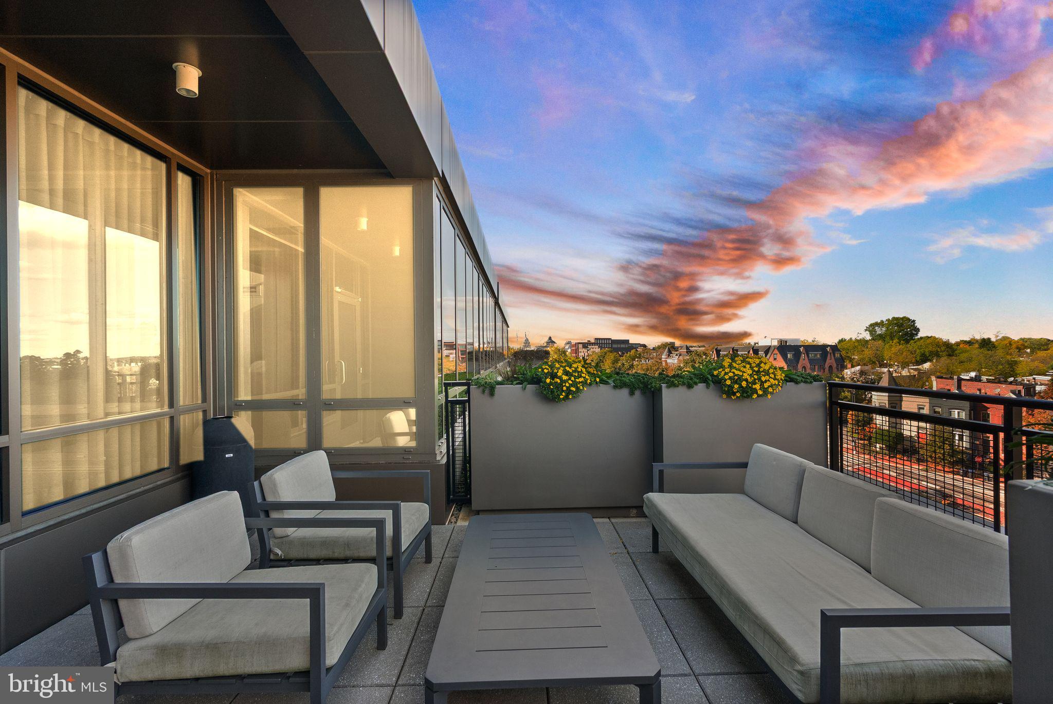 1111 Pennsylvania Ave. Southeast, Unit 304 Washington, DC 20003 - Photo 2 of 42 a terrace view with seating space