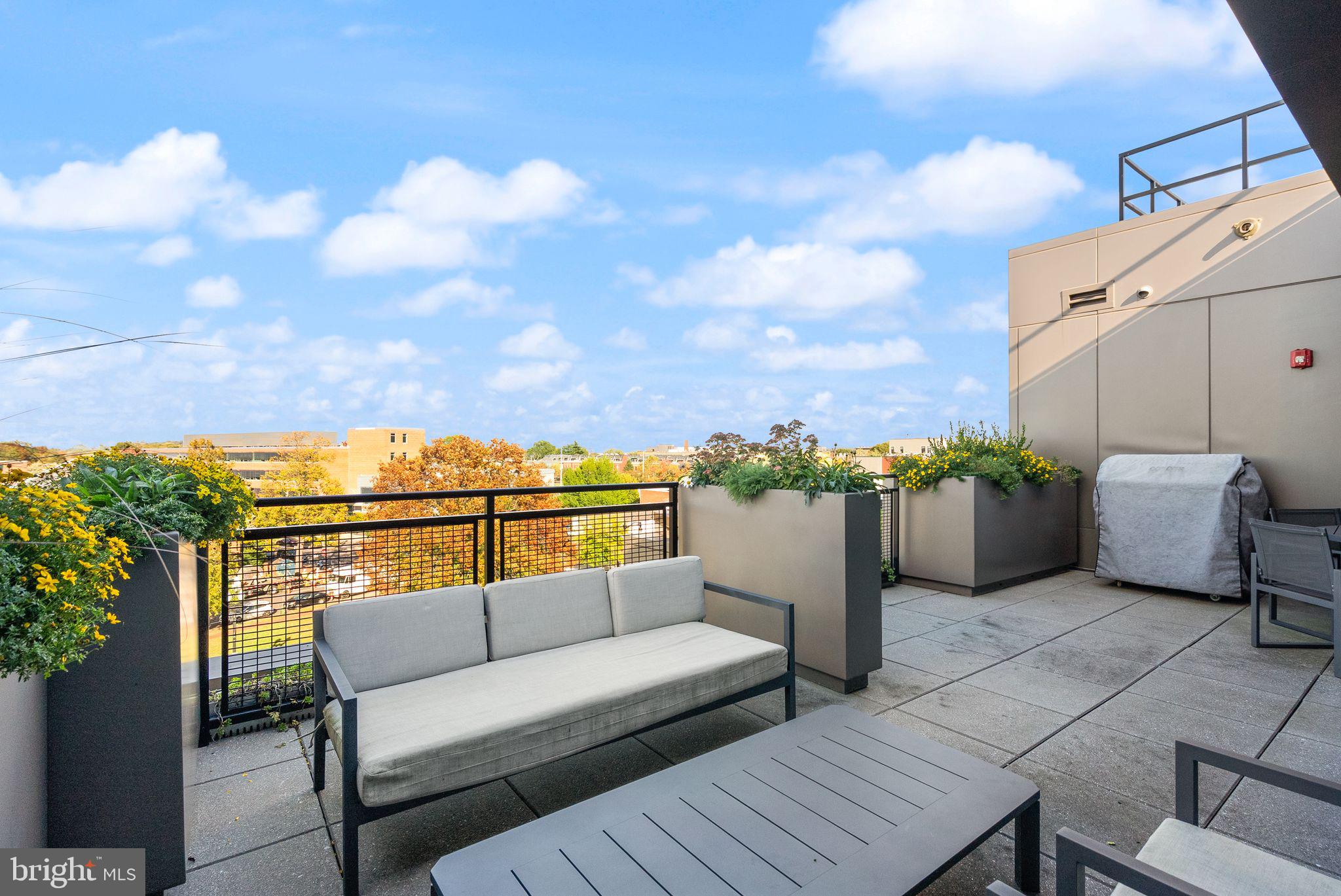 1111 Pennsylvania Ave. Southeast, Unit 304 Washington, DC 20003 - Photo 31 of 42 a terrace view with seating space