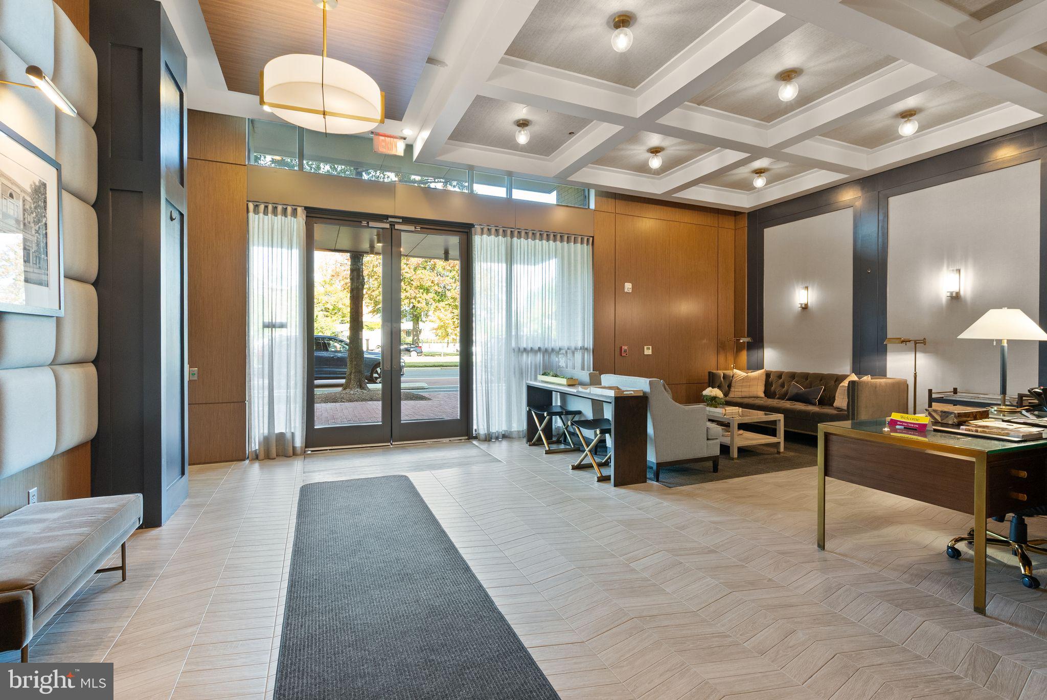 1111 Pennsylvania Ave. Southeast, Unit 304 Washington, DC 20003 - Photo 34 of 42 a lobby with furniture and chandelier