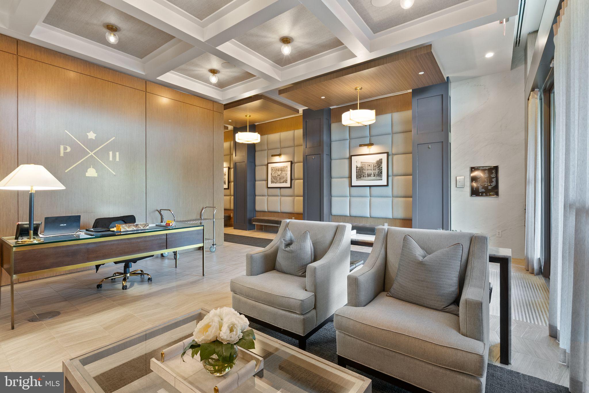 1111 Pennsylvania Ave. Southeast, Unit 304 Washington, DC 20003 - Photo 36 of 42 a living room with furniture and a table