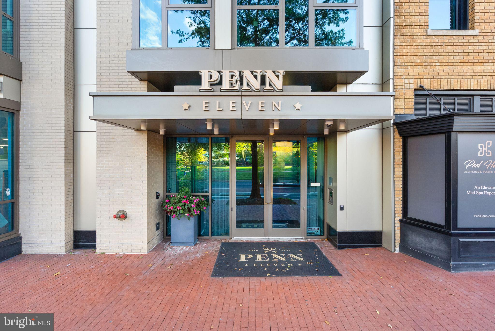 1111 Pennsylvania Ave. Southeast, Unit 304 Washington, DC 20003 - Photo 37 of 42 a front view of a building with glass windows