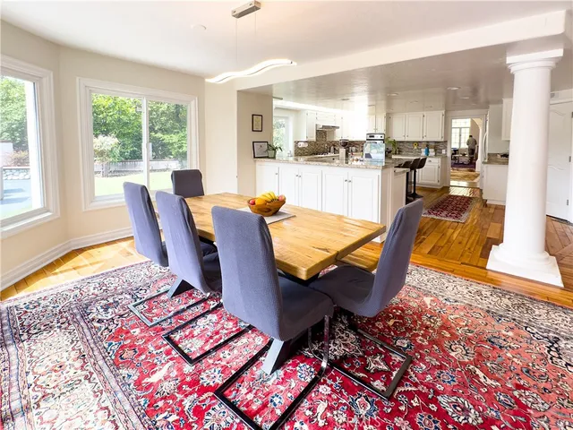 a view of a dining room with furniture