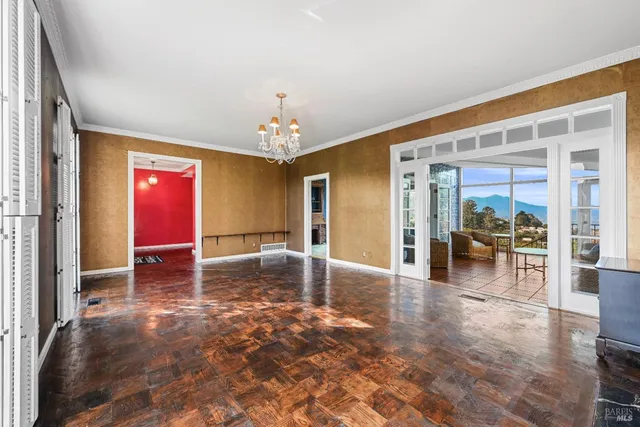 a kitchen with a sink a stove and cabinets