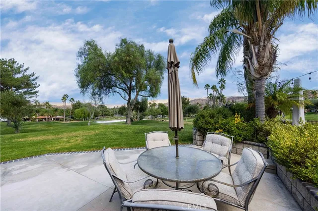 a garden view with a seating space