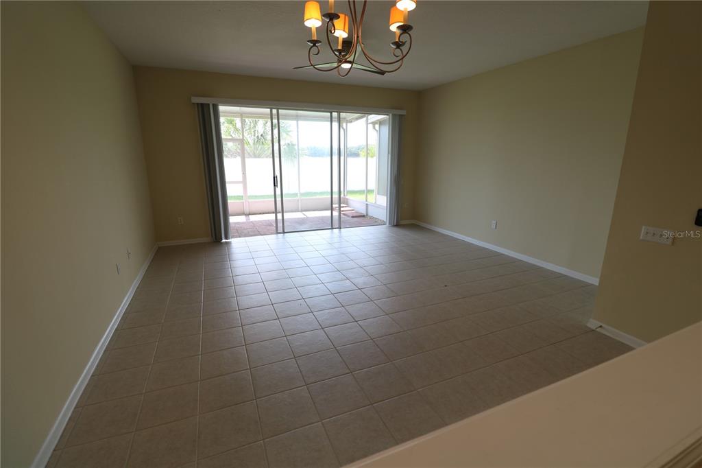 4866 Pond Ridge Drive Riverview, FL 33578 - Photo 18 of 38 a view of an empty room with a window