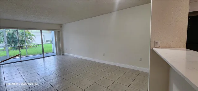 a view of a livingroom with a staircase