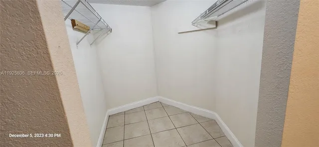 a bathroom with a sink and shower