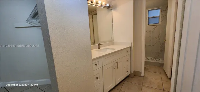 a bathroom with a shower and toilet