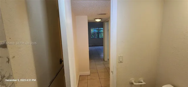 a bathroom with a sink toilet and a mirror