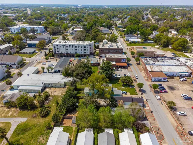 an aerial view of a city with lots of residential buildings