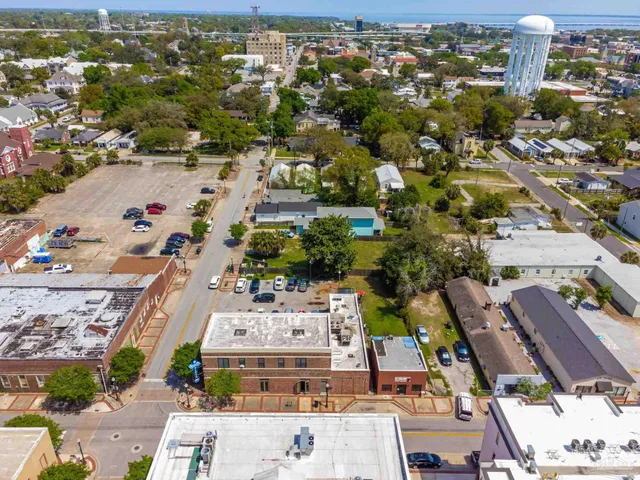 an aerial view of a city with lots of residential buildings