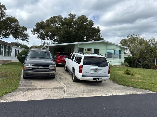a car parked in front of a house