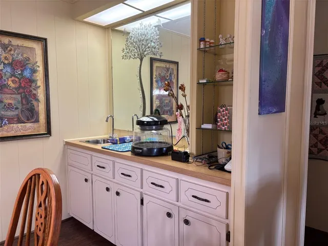 a view of bathroom with dual sinks