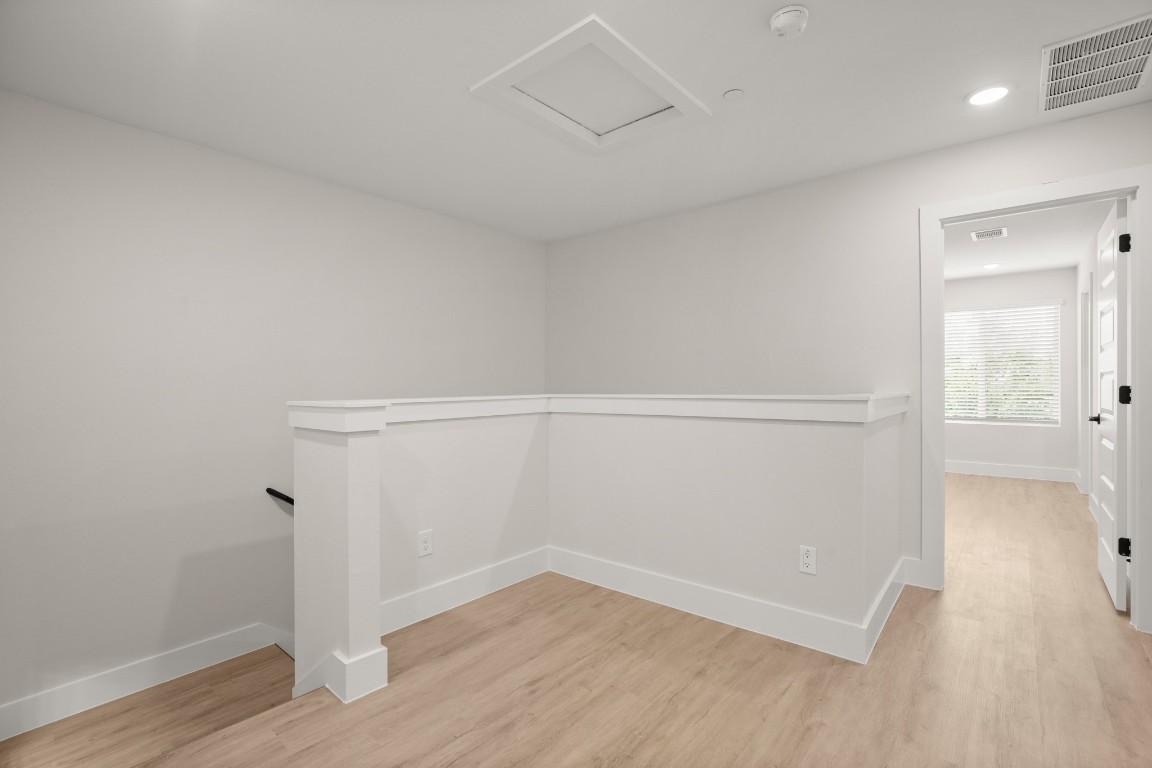 17407 Homestead Haven Drive Bee Cave, TX 78738 - Photo 10 of 16 an empty room with wooden floor