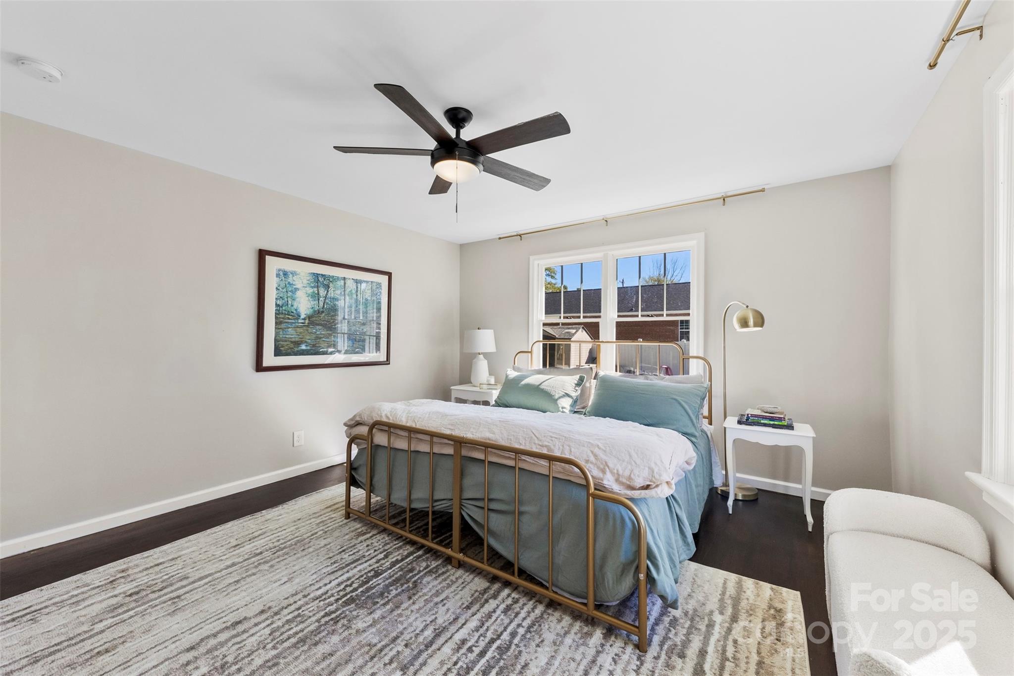 411 South Battleground Avenue Kings Mountain, NC 28086 - Photo 13 of 38 a bedroom with a bed lamp and a window