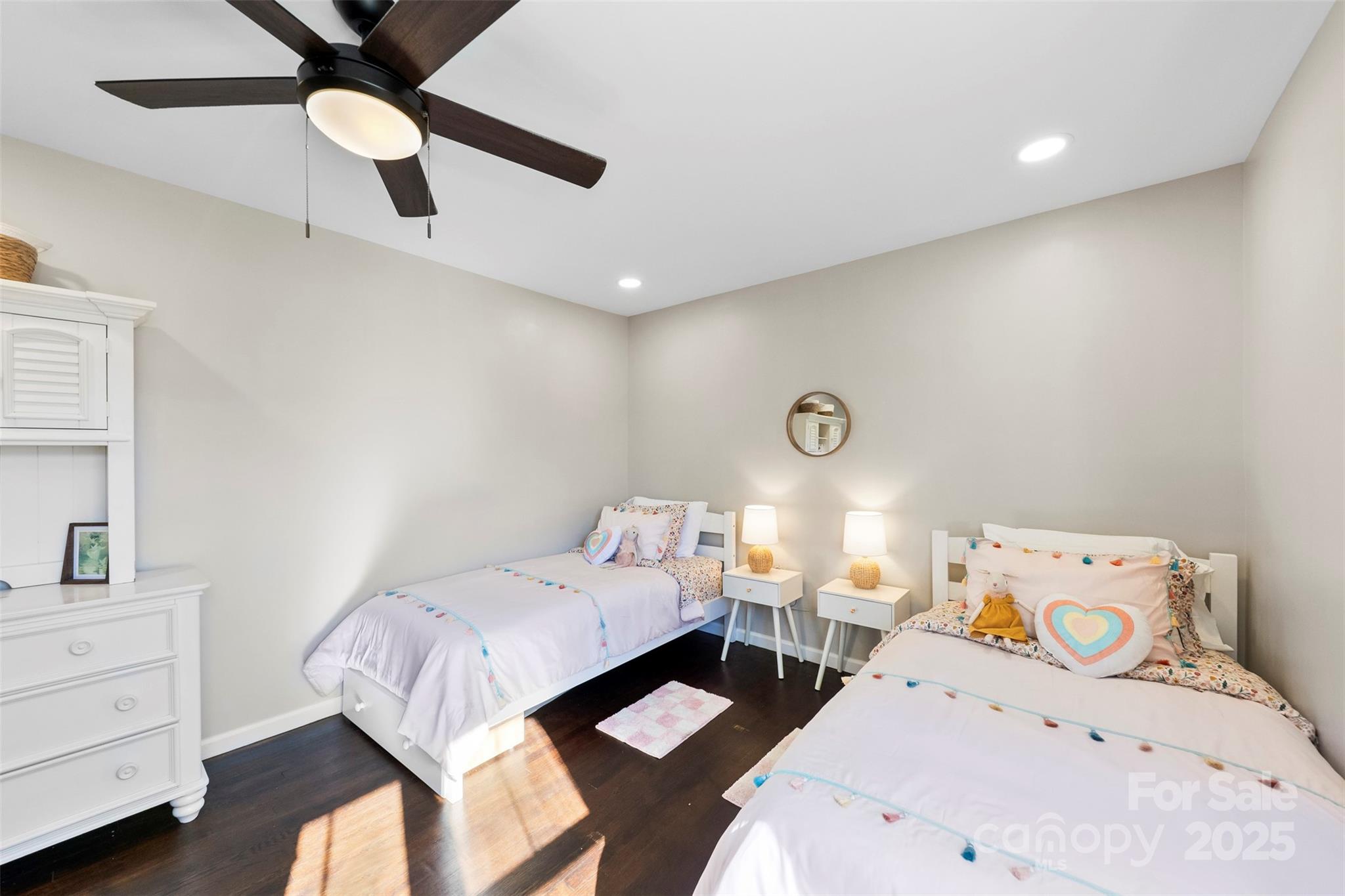 411 South Battleground Avenue Kings Mountain, NC 28086 - Photo 18 of 38 a bedroom with two beds and a dresser
