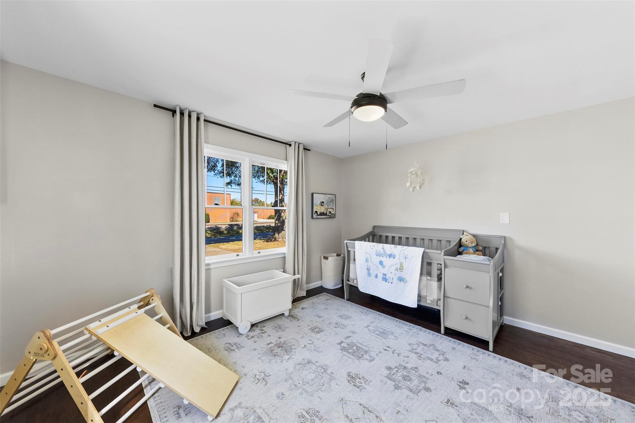 411 South Battleground Avenue Kings Mountain, NC 28086 - Photo 26 of 38 a bed room with a bed and a window