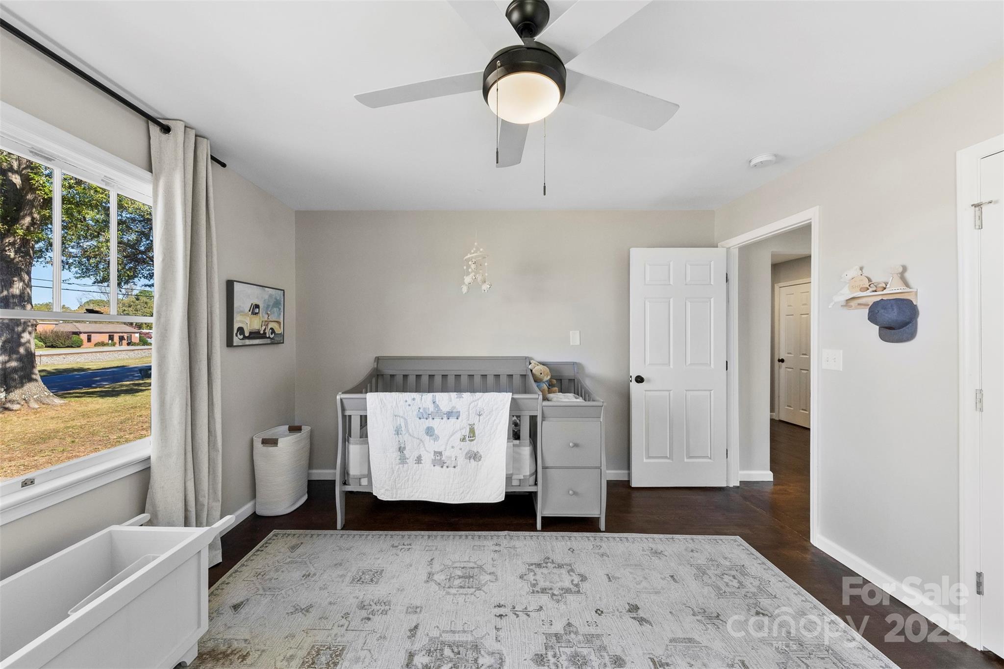 411 South Battleground Avenue Kings Mountain, NC 28086 - Photo 27 of 38 a view of a bedroom with furniture and window