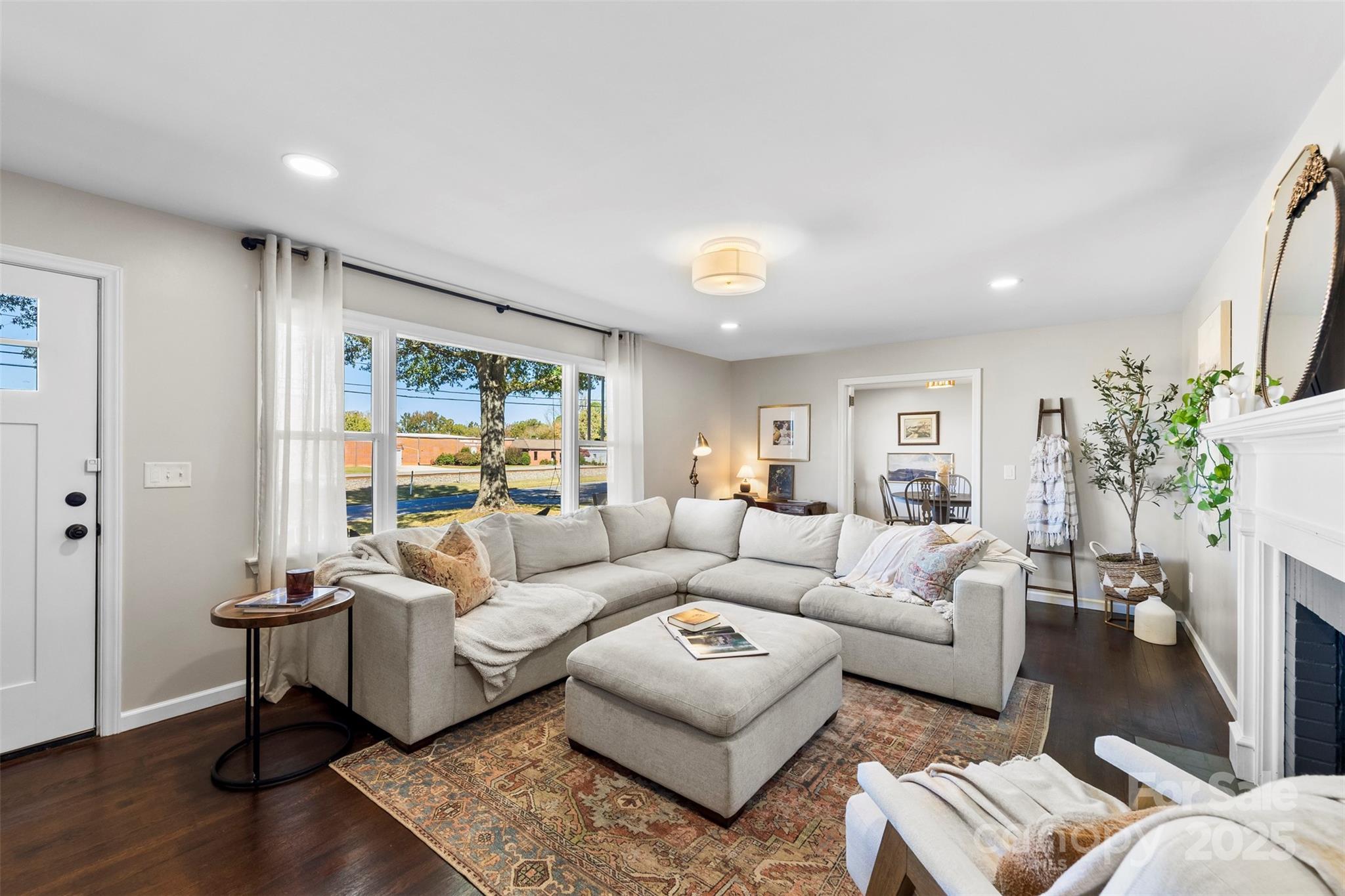 411 South Battleground Avenue Kings Mountain, NC 28086 - Photo 3 of 38 a living room with furniture and a large window