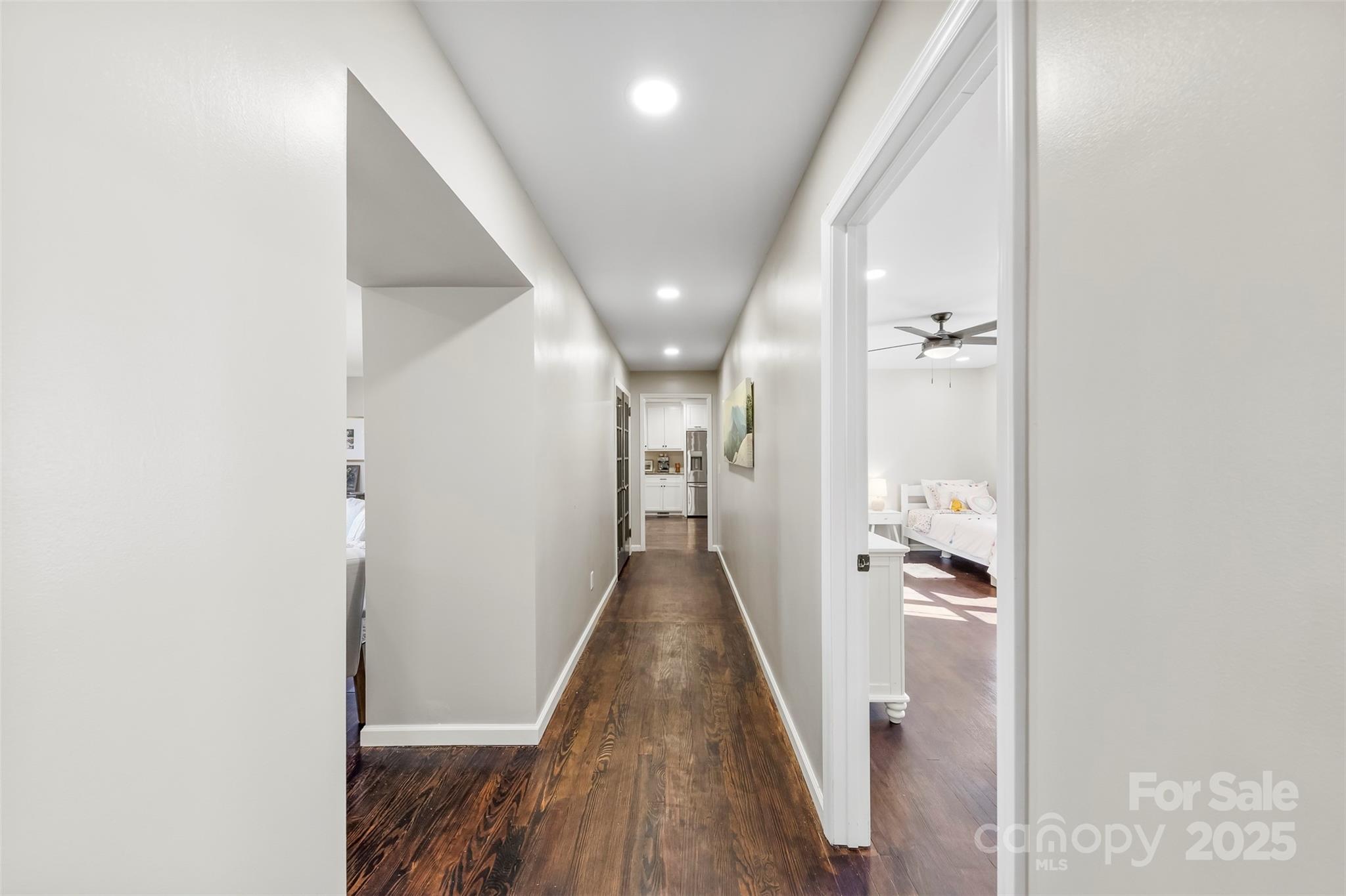 411 South Battleground Avenue Kings Mountain, NC 28086 - Photo 31 of 38 a view of a hallway with wooden floor and staircase