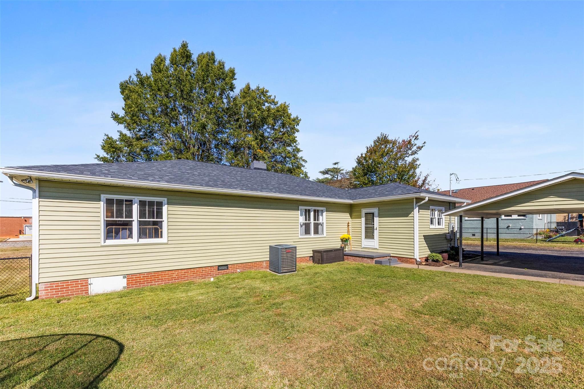 411 South Battleground Avenue Kings Mountain, NC 28086 - Photo 33 of 38 a house view with a garden space