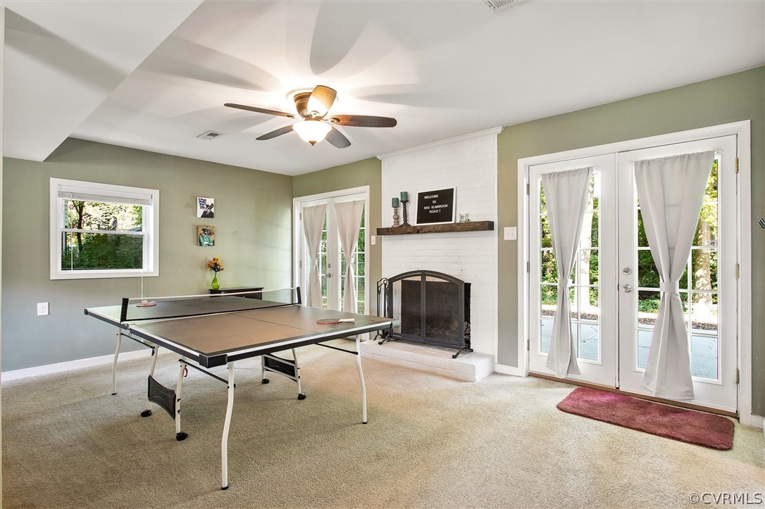 3012 Elmbrook Road Henrico, VA 23228 - Photo 16 of 32 Family room in basement with wood burning fire pla