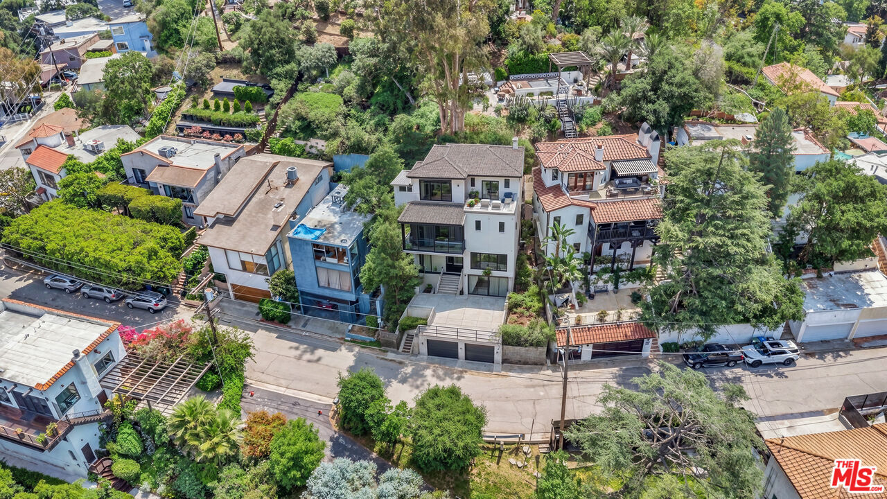 an aerial view of a house with a garden view