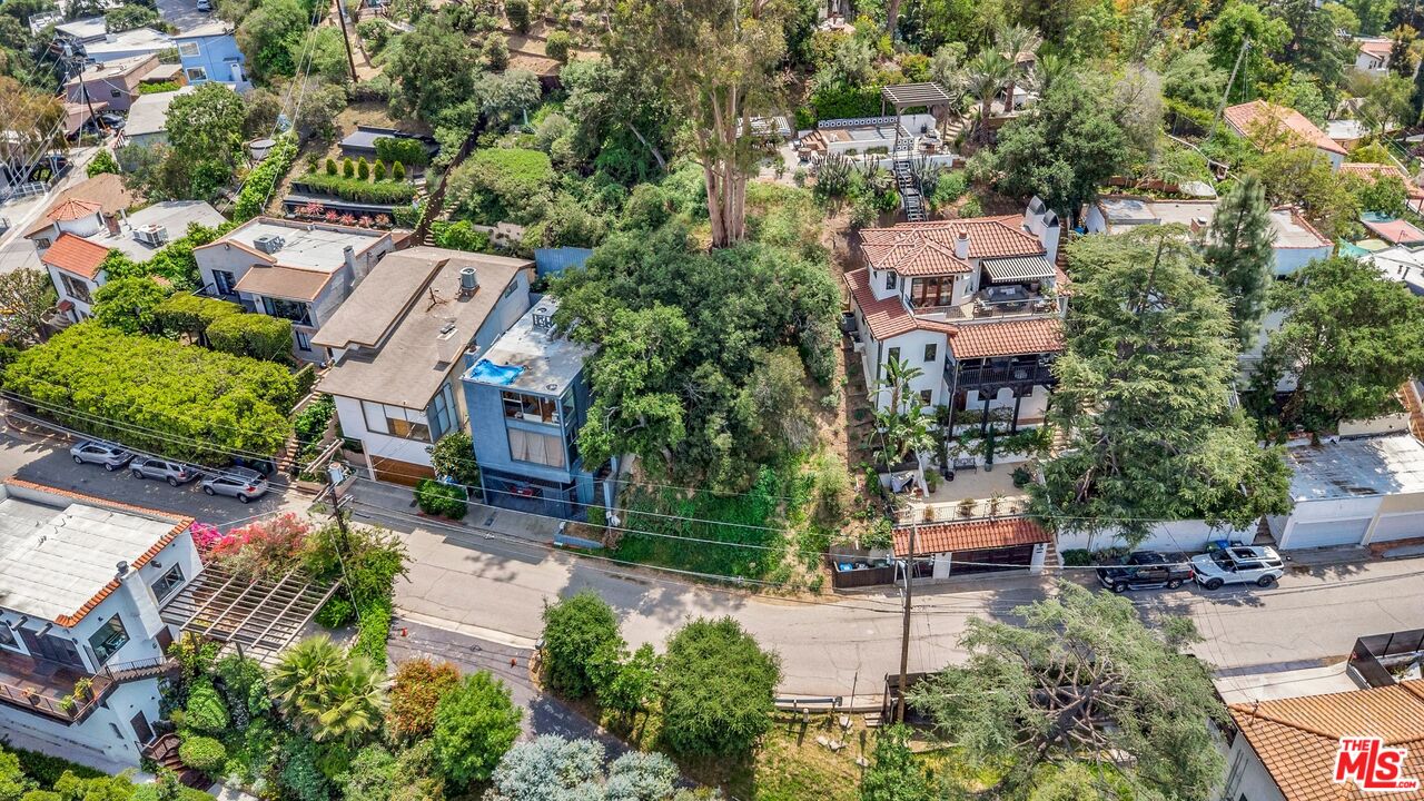 7192 Woodrow Wilson Drive Los Angeles, CA 90068 - Photo 7 of 8 an aerial view of multiple houses with yard