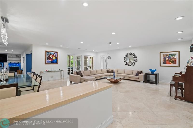 3401 North 31st Terrace Hollywood, FL 33021 - Photo 13 of 35 a living room with furniture and a flat screen tv