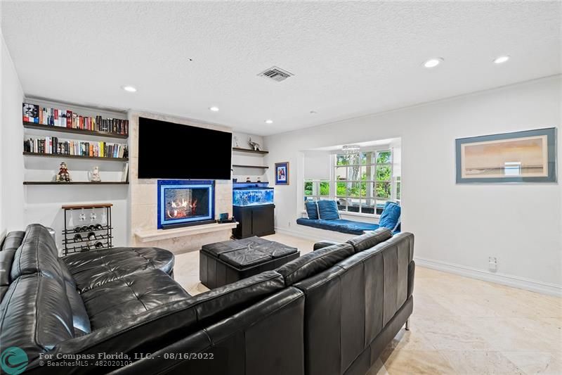 3401 North 31st Terrace Hollywood, FL 33021 - Photo 20 of 35 a kitchen with stainless steel appliances granite countertop a stove a sink and a microwave