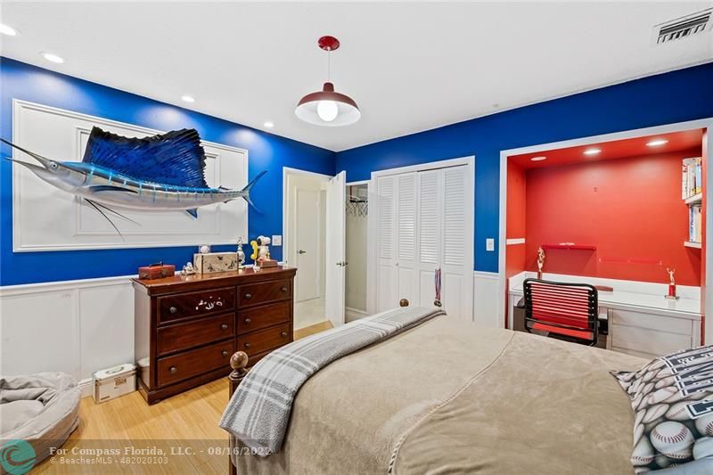 3401 North 31st Terrace Hollywood, FL 33021 - Photo 32 of 35 a bedroom with a bed and a dresser