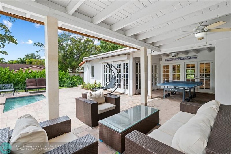 3401 North 31st Terrace Hollywood, FL 33021 - Photo 6 of 35 a living room with furniture and a large window