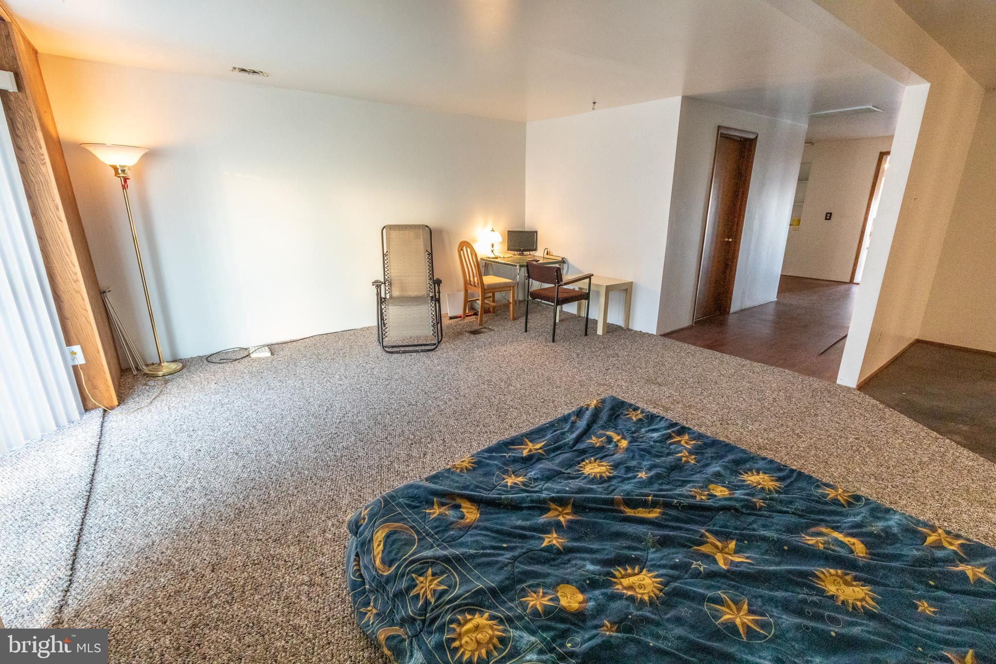 60 Policeman Club Road Falling Waters, WV 25419 - Photo 16 of 32 Full carpeted and open makes it feel even larger
