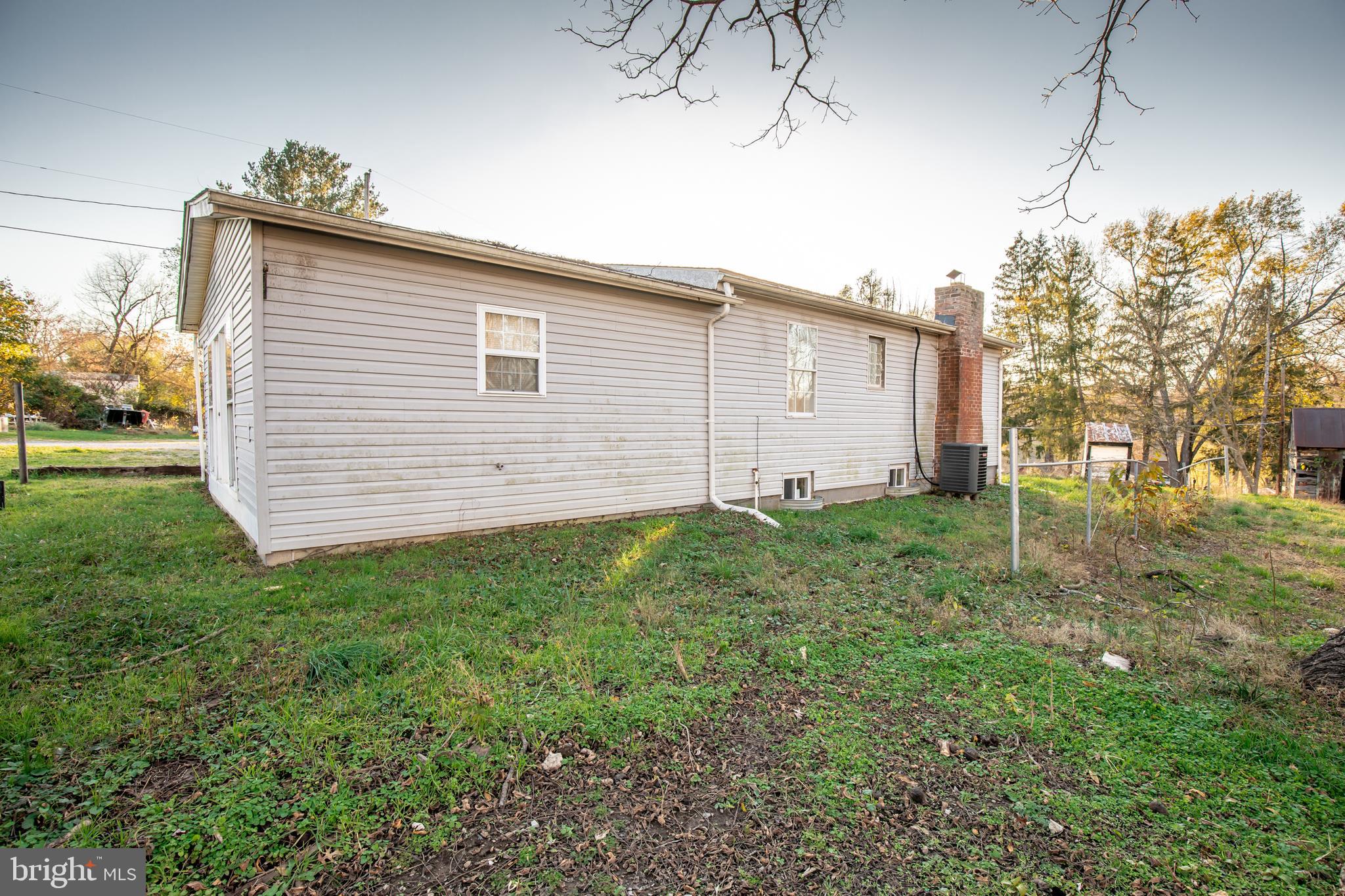 60 Policeman Club Road Falling Waters, WV 25419 - Photo 3 of 32 Great yard *Not pictured detached 3 car garage*