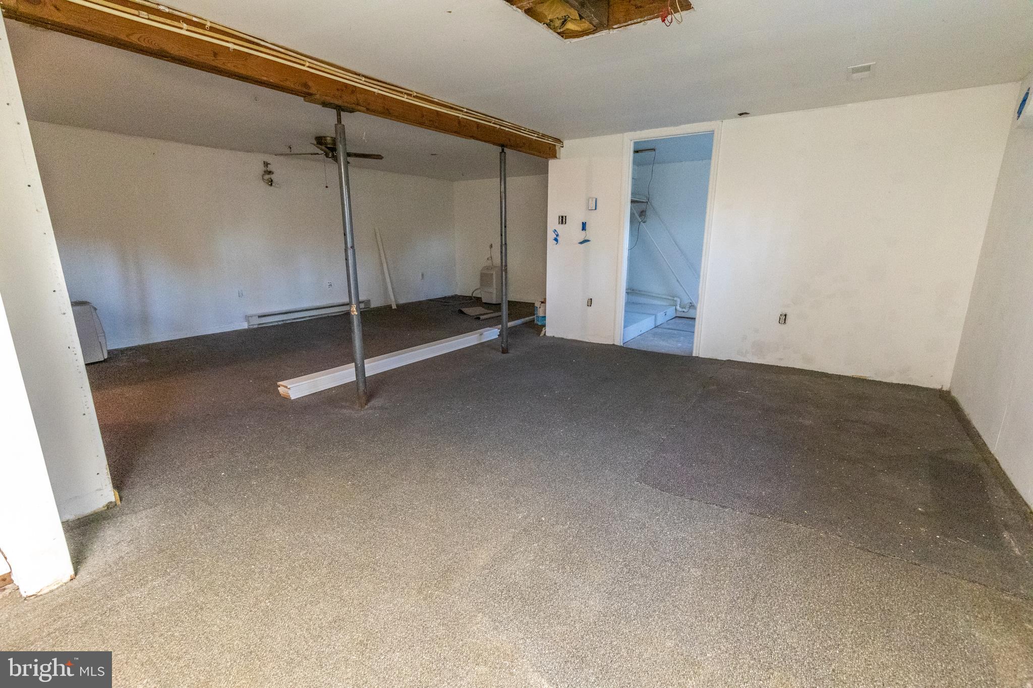 60 Policeman Club Road Falling Waters, WV 25419 - Photo 24 of 32 Basement is partially finished with carpet